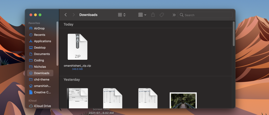 zip file in Downloads folder on Mac.